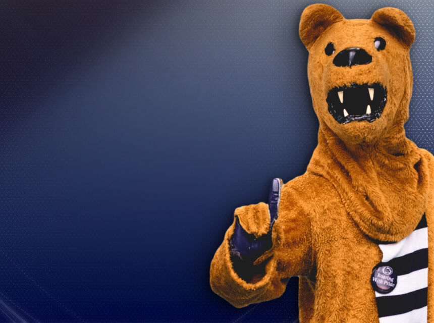 Nittany Lion mascot with one finger pointing up on dark blue gradient background.